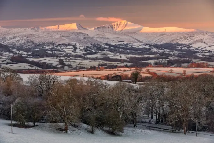 Framed Print : View of snow covered farmland and hills at sunrise, near Llangorse (Talyllyn), Penyfan, Brecon Beacons N. P Framed Print : View of snow covered farmland and hills at sunrise, near Llangorse (Talyllyn), Penyfan, Brecon Beacons N. P