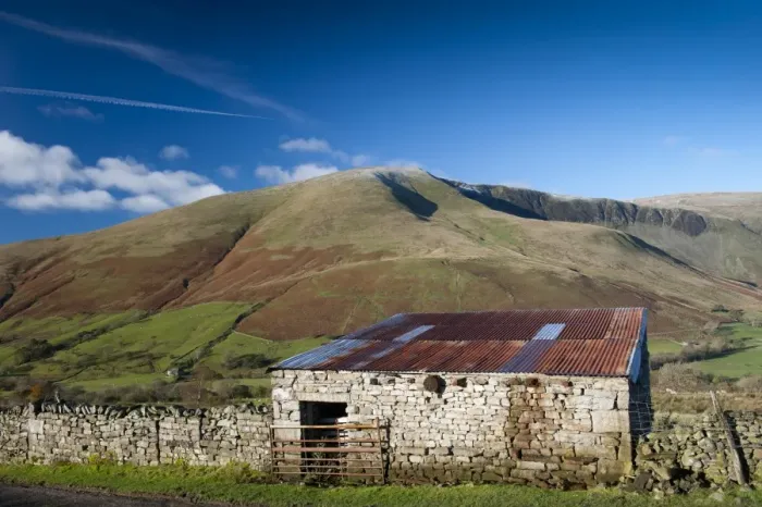 Framed Print : View of stone barn and farmland in fell valley, looking from Bluecaster, Cautley Crag, Sedbergh, Howgill Fells