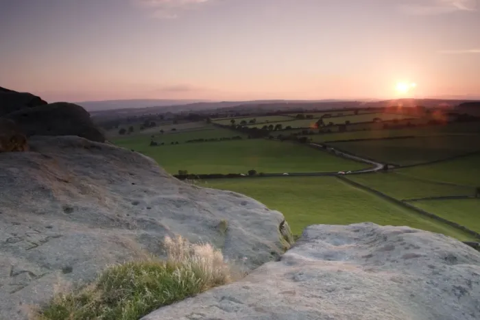 Framed Print : View over surrounding farmland from Almscliff Crag rock formation at sunset, North Rigton, North Yorkshire, England Framed Print : View over surrounding farmland from Almscliff Crag rock formation at sunset, North Rigton, North Yorkshire, England