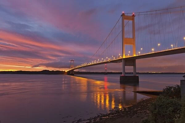 View of suspension bridge at dawn, viewed from Beachley looking towards Monmouthshire, Severn Bridge, River Severn, Severn Estuary, Gloucestershire, England, october