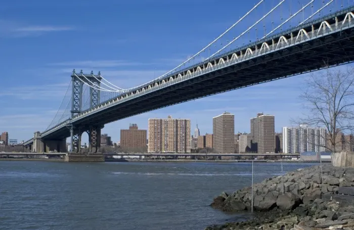 Framed Print : View of suspension bridge and saltwater tidal strait, looking towards Lower Manhattan, Manhattan Bridge, East River