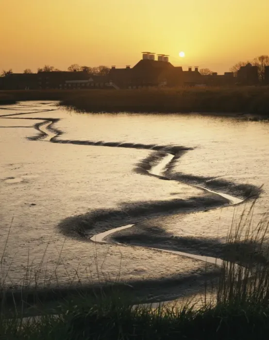 Framed Print : View of tidal river at low tide and arts complex on riverbank at sunset, Snape Maltings, River Alde, Snape, Suffolk Framed Print : View of tidal river at low tide and arts complex on riverbank at sunset, Snape Maltings, River Alde, Snape, Suffolk