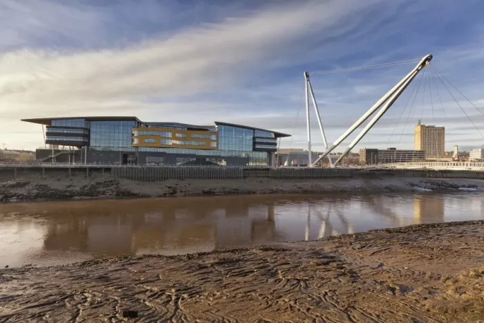 Framed Print : View of tidal river, waterfront buildings and footbridge, Newport University, Newport City Footbridge, River Usk Framed Print : View of tidal river, waterfront buildings and footbridge, Newport University, Newport City Footbridge, River Usk