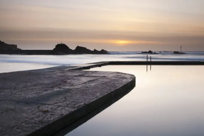 Framed Print : View of tidal swimming pool with incoming tide and waves breaking over breakwater at sunset, Bude Sea Pool Framed Print : View of tidal swimming pool with incoming tide and waves breaking over breakwater at sunset, Bude Sea Pool