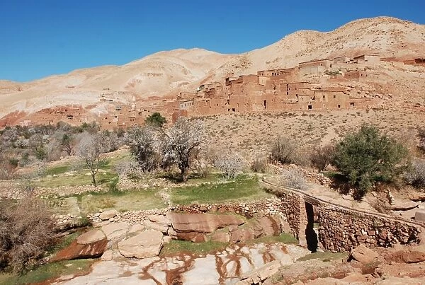 View of traditional adobe built village, High Atlas Mountains, Morocco, January