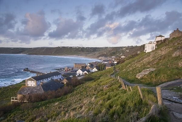 View of village and coastline, Sennen Cove, Sennen, Cornwall, England, May