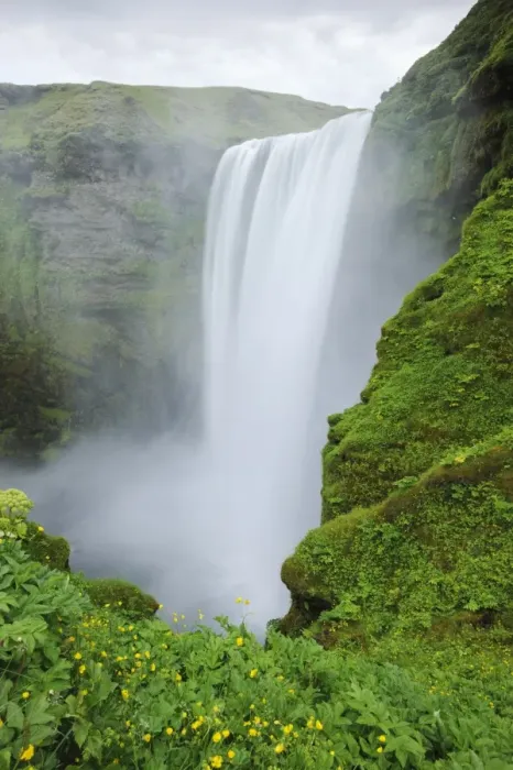 Framed Print : View of waterfall flowing over cliff, Skogafoss, Skoga River, Iceland, July Framed Print : View of waterfall flowing over cliff, Skogafoss, Skoga River, Iceland, July
