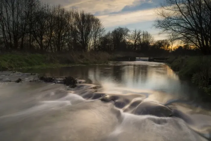 Framed Print : View of weir on river tributary at sunset, Little Stour, Canterbury, Kent, England, January Framed Print : View of weir on river tributary at sunset, Little Stour, Canterbury, Kent, England, January