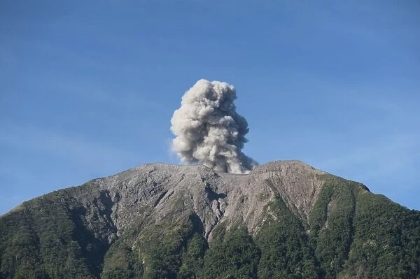 Volcanic eruption with ash plume, Mount Komba, Alor Archipelago, Lesser Sunda Islands, Indonesia, November 2013