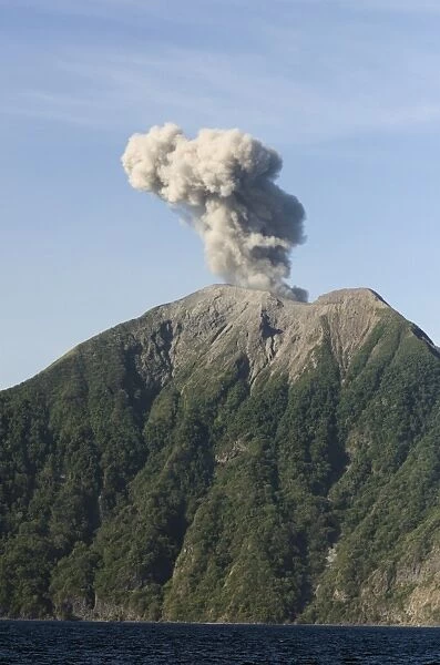 Volcanic eruption with ash plume, Mount Komba, Alor Archipelago, Lesser Sunda Islands, Indonesia, November 2013