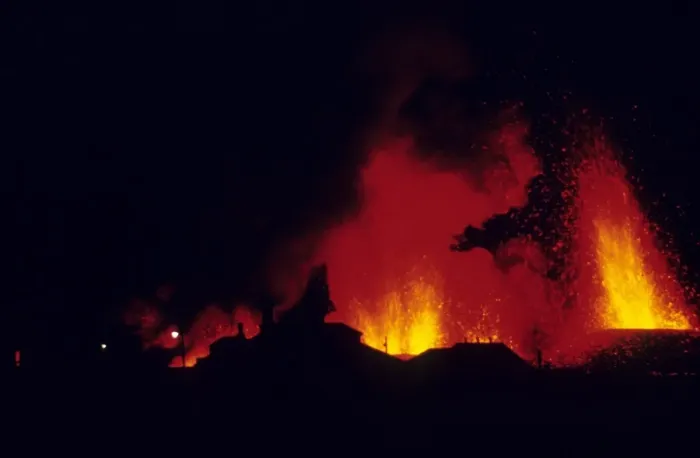 Framed Print : Volcanic eruption, with erupting lava and town buildings silhouetted, Eldfell Volcano, Heimaey, Westmann Isles Framed Print : Volcanic eruption, with erupting lava and town buildings silhouetted, Eldfell Volcano, Heimaey, Westmann Isles