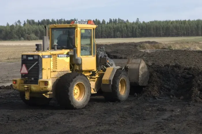 Framed Print : Volvo L50 D wheel loader, loading muck into bucket, to load muck spreader, Sweden, autumn Framed Print : Volvo L50 D wheel loader, loading muck into bucket, to load muck spreader, Sweden, autumn