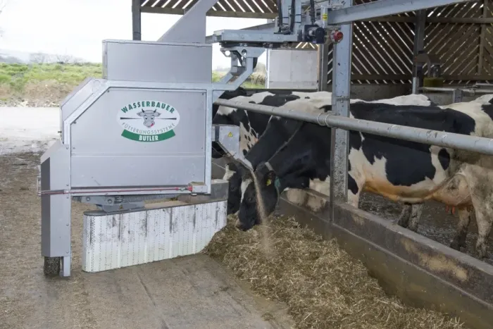 Framed Print : Wasserbauer Butler automatic feeder and scraper on dairy farm, Lancashire, England, February Framed Print : Wasserbauer Butler automatic feeder and scraper on dairy farm, Lancashire, England, February