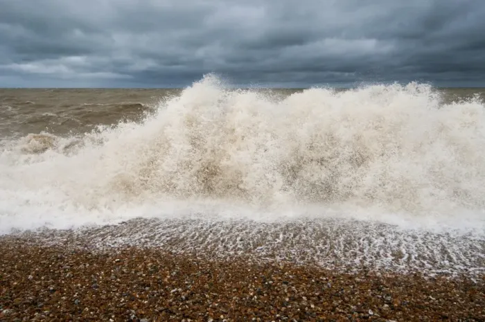 Framed Print : Waves crashing against shoreline of shingle beach, Dungeness, Kent, England, June Framed Print : Waves crashing against shoreline of shingle beach, Dungeness, Kent, England, June