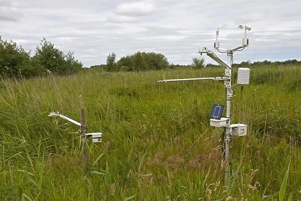 Weather recording station in marshland, Sutton Fen RSPB Reserve, The Broads, Norfolk, England, July