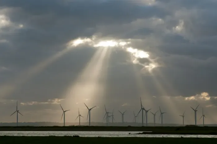 Framed Print : Wind turbines on windfarm with sunbeams through clouds at sunset, Little Cheyne Court, Romney Marsh, Kent, England Framed Print : Wind turbines on windfarm with sunbeams through clouds at sunset, Little Cheyne Court, Romney Marsh, Kent, England