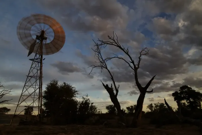 Framed Print : Windpump in desert at sunset, Kalahari Meerkat Project, Kuruman River Reserve, Kalahari Desert, Northern Cape