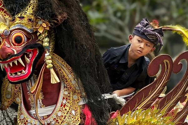Young boy during cremation parade, Bali, Lesser Sunda Islands, Indonesia, July