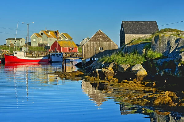 Canada, Nova Scotia, Peggys Cove. Fishing boats in village harbor