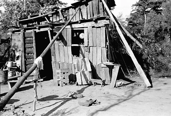 ARKANSAS: SHACK, 1935. A squatters shack in Arkansas. Photograph by Ben Shahn