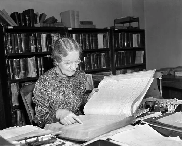 CENSUS ANALYSIS, 1937. Mary C. Oursler, Custodian of Census Records, going through