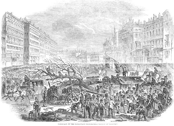 FRANCE: REVOLUTION OF 1848. Barricade on the Boulevard Montmartre. Wood engraving from a contemporary English newspaper
