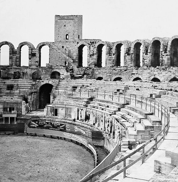 FRANCE: ROMAN ARENA, c1929. Ruins of a Roman arena in Arles, France, late 1st century
