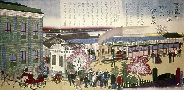 JAPAN: RAILROAD, 1872. View of railroad station (with train schedule at top) on line connecting Yokohama and Tokyo. Woodblock print, 1872, by Ando Hiroshige