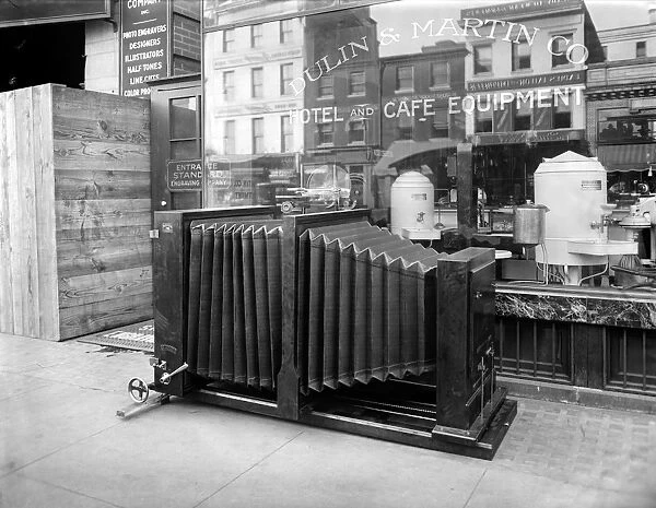 LARGE CAMERA, c1920. An extra large camera in front of the Standard Engraving Company in Washington, D. C. c1920