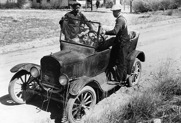 MODEL T FORD, 1941. African American young men and their Model T Ford near Pacolet