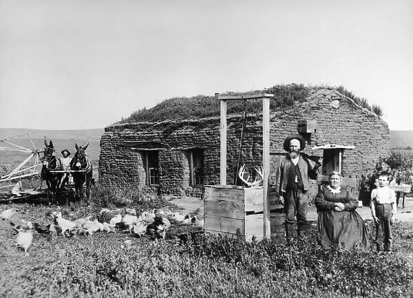 NEBRASKA: SETTLERS, 1888. Homesteader James McCrea and family in front of their