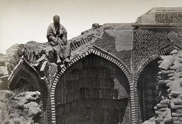 SAMARKAND: MAUSOLEUM RUINS. Man seated on the ruins of a mausoleum in Samarkand