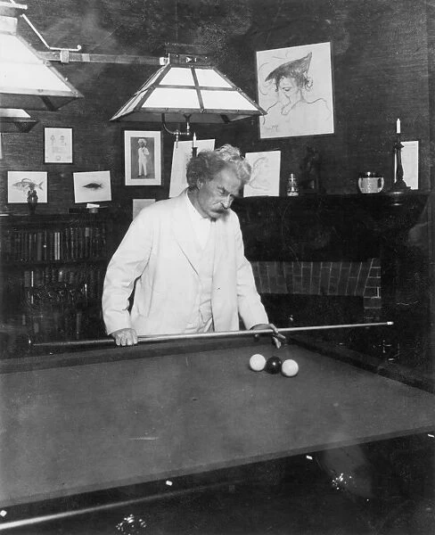 SAMUEL L. CLEMENS (1835-1910). Mark Twain: American humourist and writer. Photographed at home