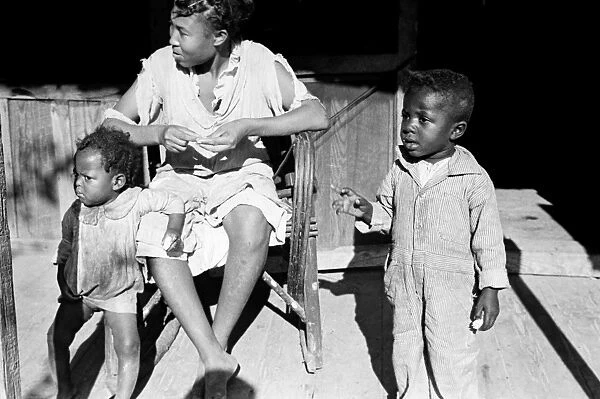 SHARECROPPER FAMILY, 1935. A family of an African American sharecropper in Little Rock, Arkansas