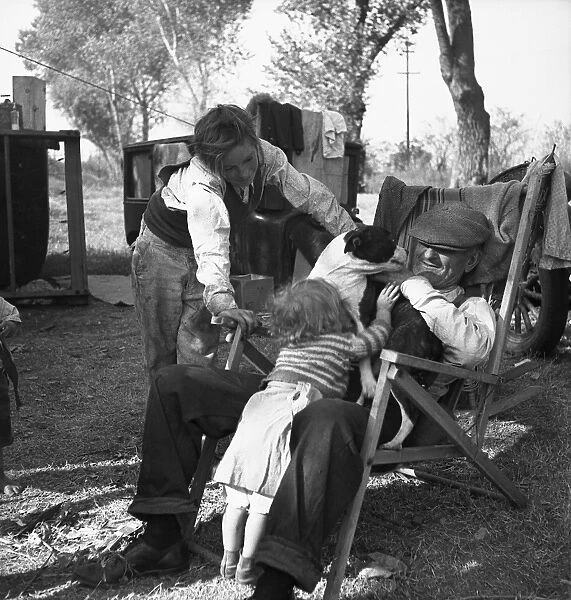 SQUATTER CAMP, 1936. A family in an open air camp near the American River in Sacramento