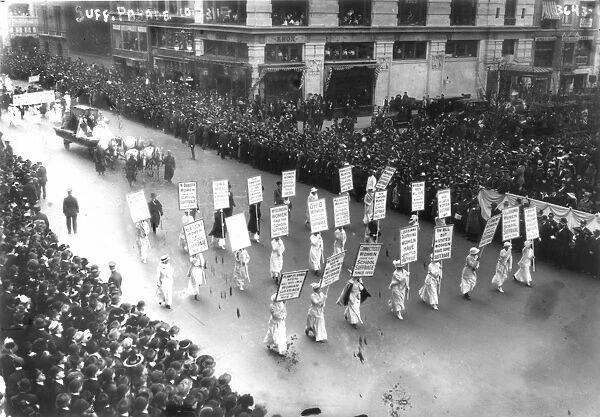 SUFFRAGE PARADE, 1913. Suffragists marching for the vote up Fifth Avenue, New York City