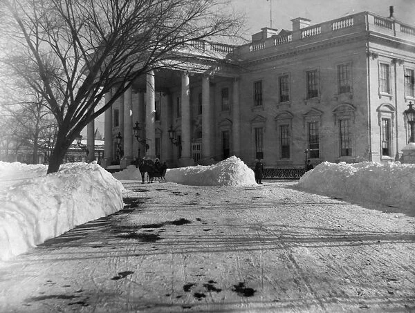 WHITE HOUSE IN SNOW, 1903. The White House in Washington, D. C. after a heavy snow