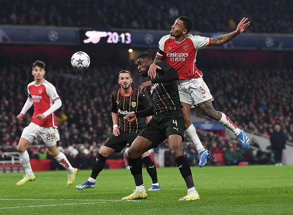 Arsenal vs RC Lens: Tense Moment as Gabriel Jesus Heads the Ball in UEFA Champions League Group B Match