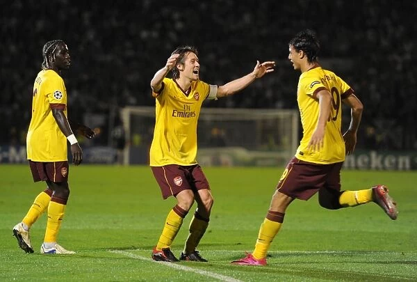 Chamakh and Rosicky-Sagna: Celebrating Arsenal's 2nd Goal in Partizan Belgrade's Stadium (UEFA Champions League)