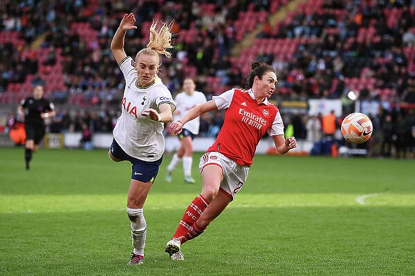 Intense Rivalry: Jodie Taylor vs Molly Bartrip in the FA Women's Super League Showdown between Tottenham Hotspur and Arsenal