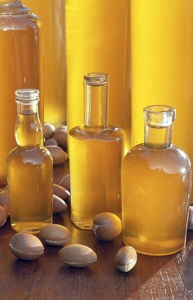 Bottles of oil and seeds from argan tree