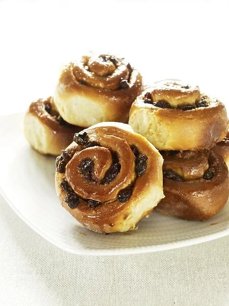 Chelsea buns on plate, close-up