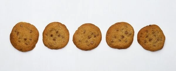 Five chocolate chip cookies in a row