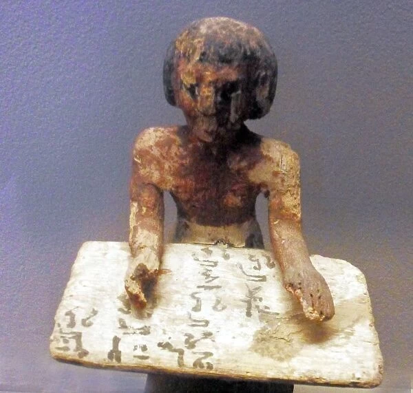 Egyptian tomb figure depicting a scribe