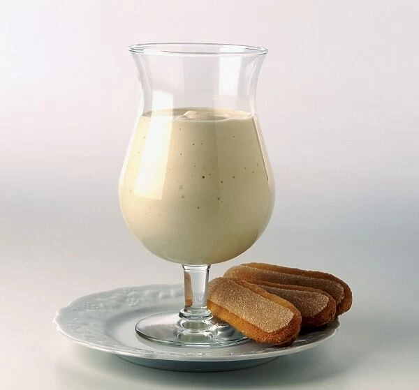 Glass of Zabaglione served with sponge fingers