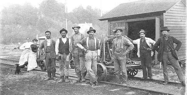 This photo depicts a Northern Pacific Railway (USA) section crew. The unidentified crew members