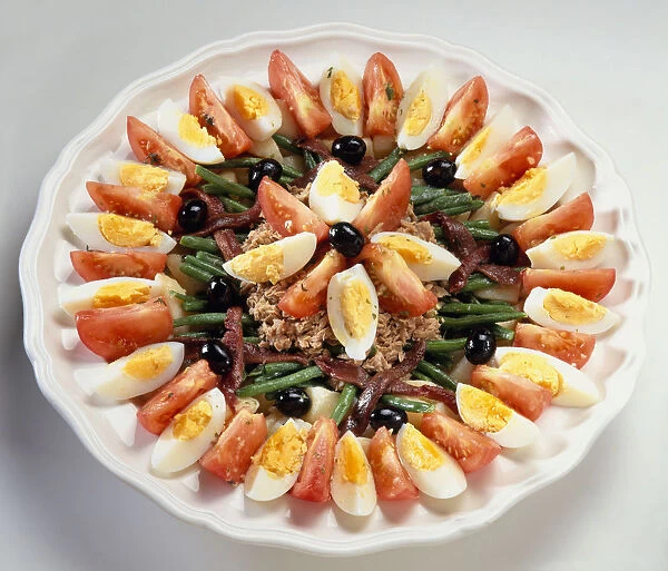 Salad nicoise on large white plate