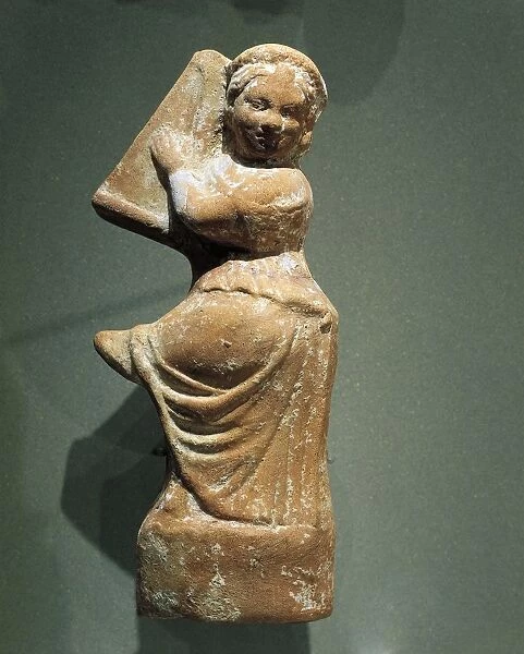 Terracotta figurine depicting a cither player from Kharayeb