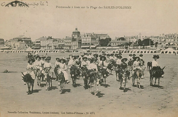 Donkey rides on the beach at Les Sables-d Olonne in western France. Postcard sent in 1913