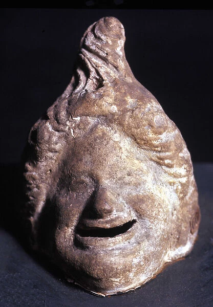 Greek theatre mask depicting an old woman. Terracotta. Greek Art, Southern Italy